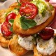 Bruschetta de queso crema cherry y pesto x20